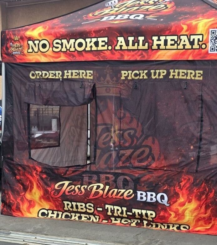 The Jess Blaze BBQ canopy set up at an event