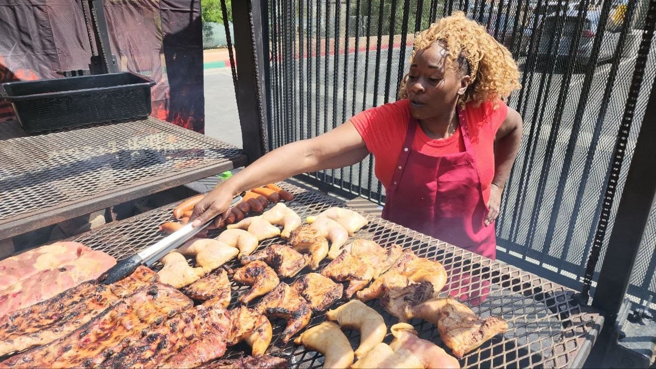 Jess working the open-flame pit