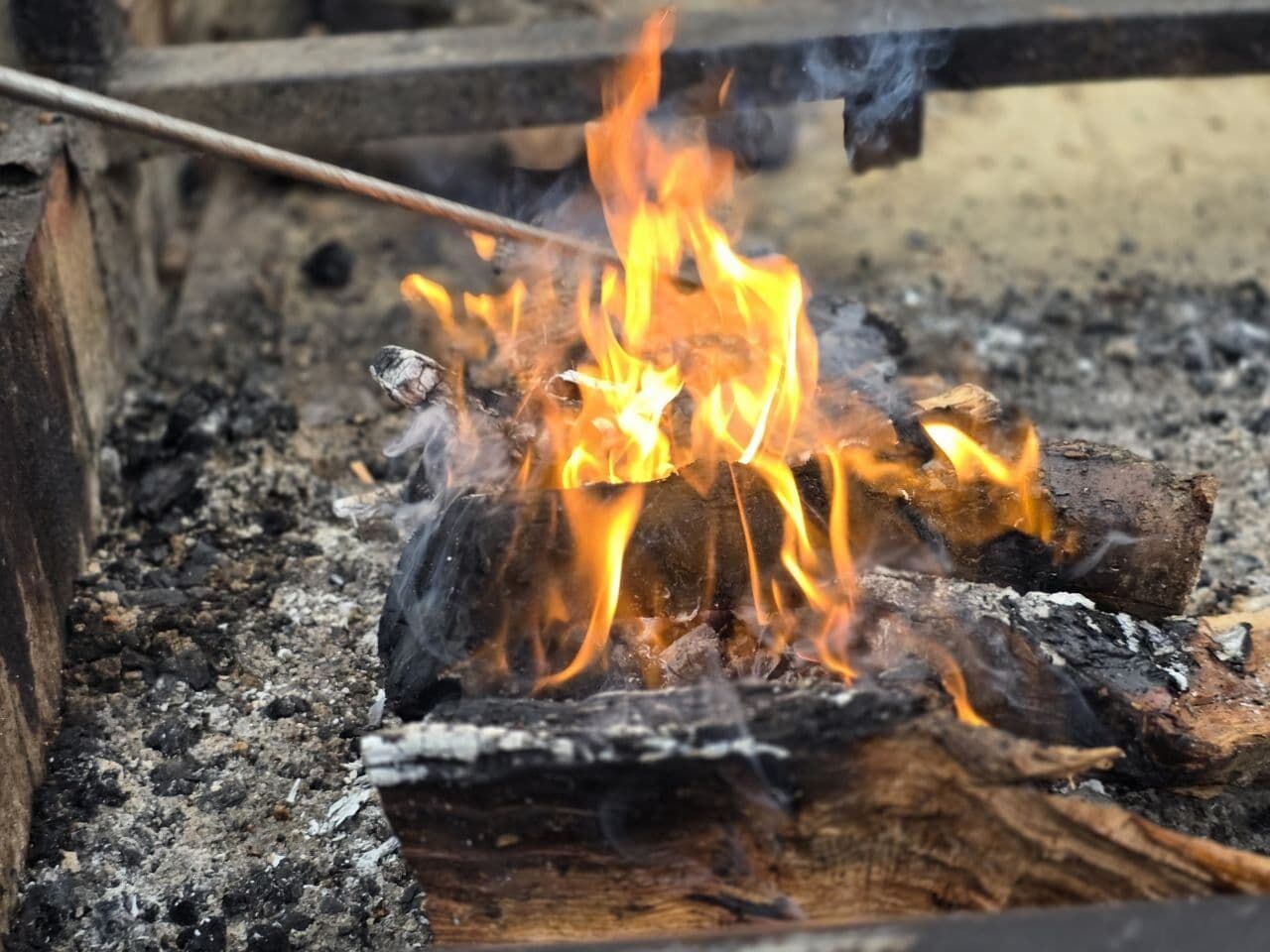 Wood burning in the open-flame pit